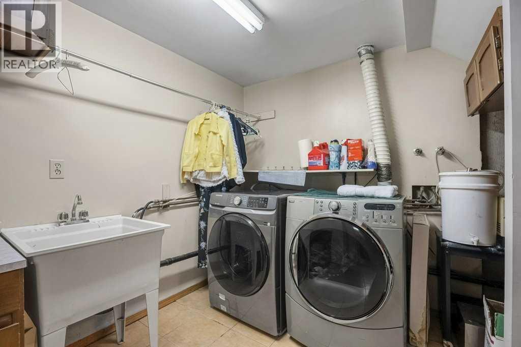 4704 Marbury Place Ne, Calgary, AB - Indoor Photo Showing Laundry Room