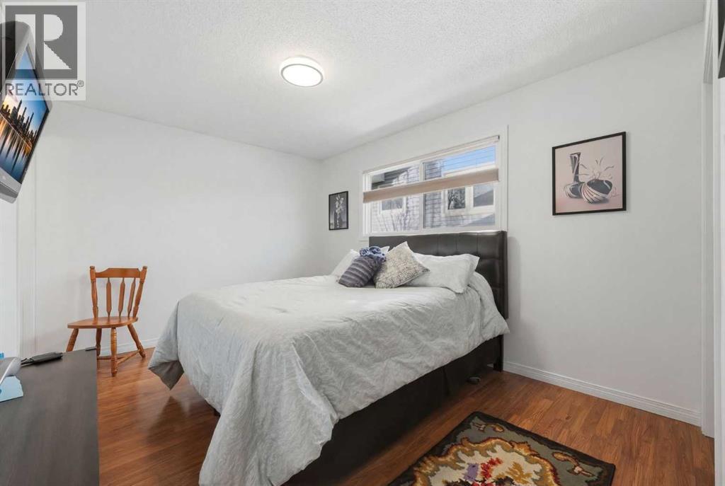 63 Huntmeadow Road Ne, Calgary, AB - Indoor Photo Showing Bedroom