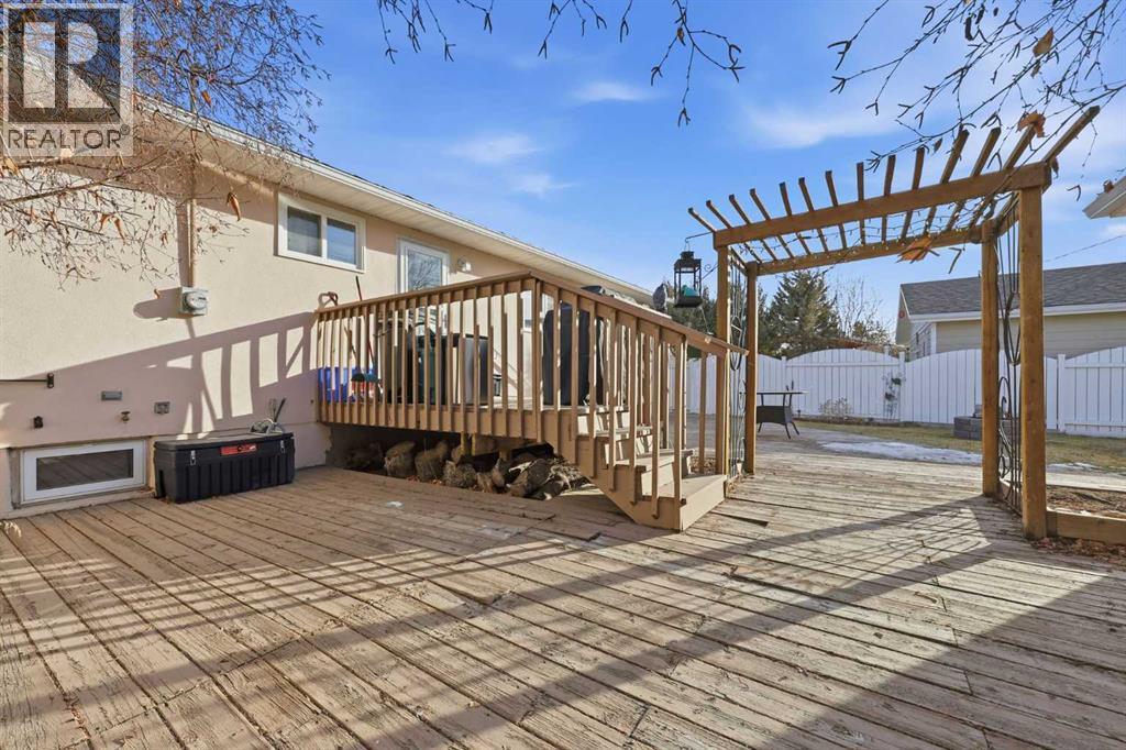 63 Huntmeadow Road Ne, Calgary, AB - Outdoor With Deck Patio Veranda With Exterior