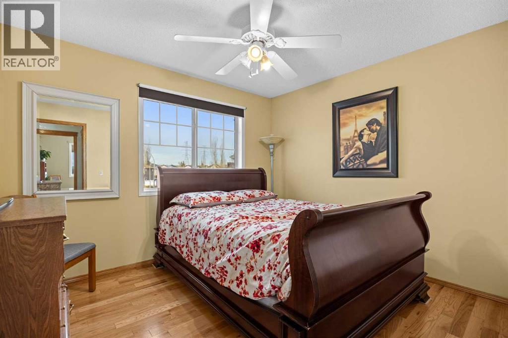 244 Oakmere Place, Chestermere, AB - Indoor Photo Showing Bedroom