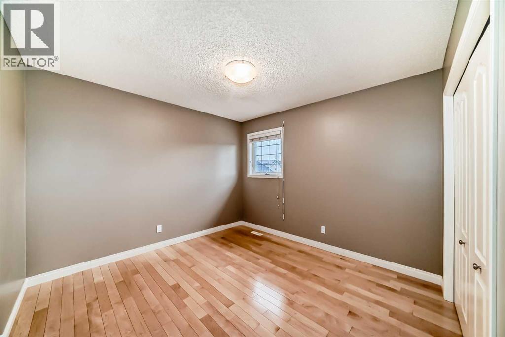 668 Scimitar Bay Nw, Calgary, AB - Indoor Photo Showing Other Room