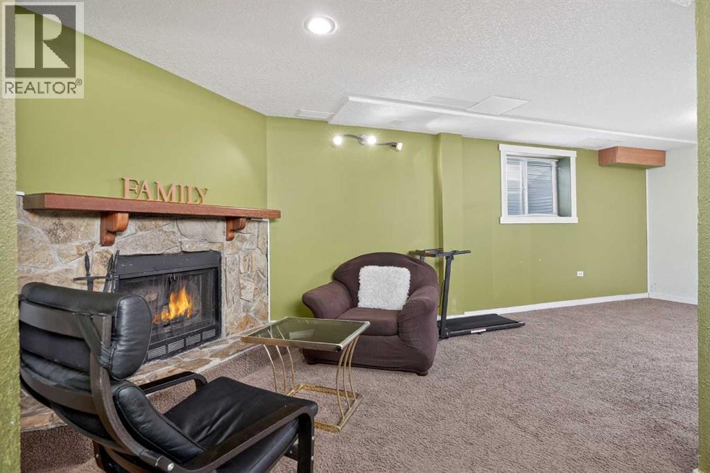 3503 42 Street Ne, Calgary, AB - Indoor With Fireplace