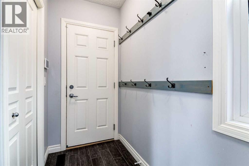 14 Marquis Heights Se, Calgary, AB - Indoor Photo Showing Other Room