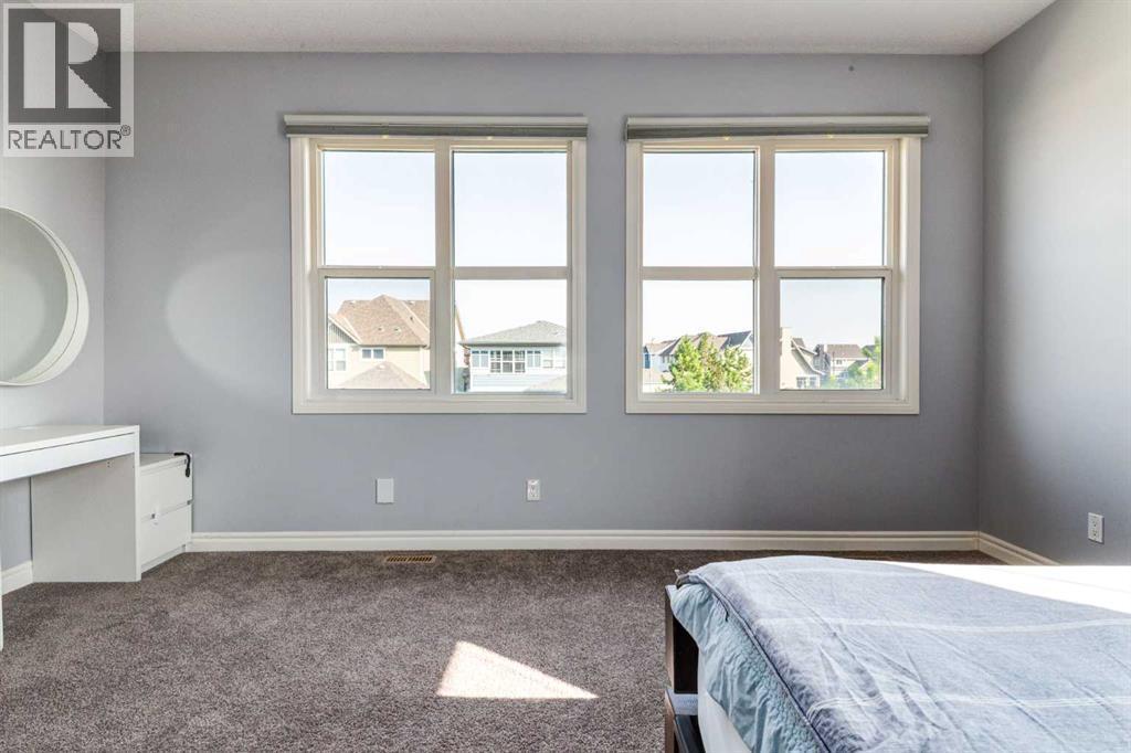 14 Marquis Heights Se, Calgary, AB - Indoor Photo Showing Bedroom