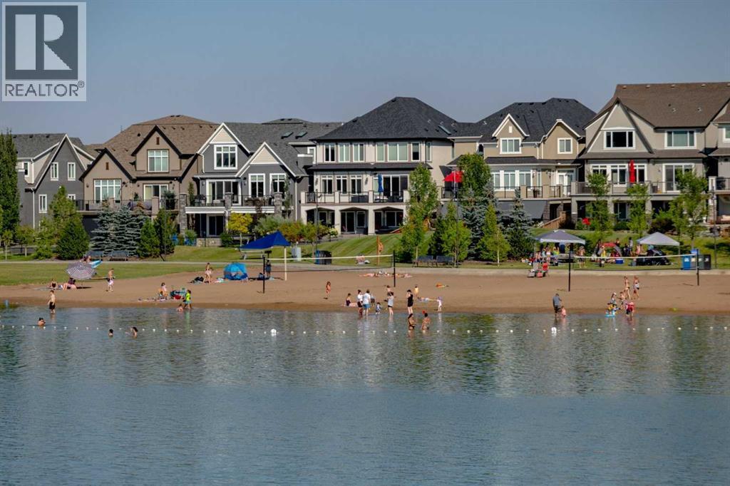 14 Marquis Heights Se, Calgary, AB - Outdoor With Body Of Water With Facade
