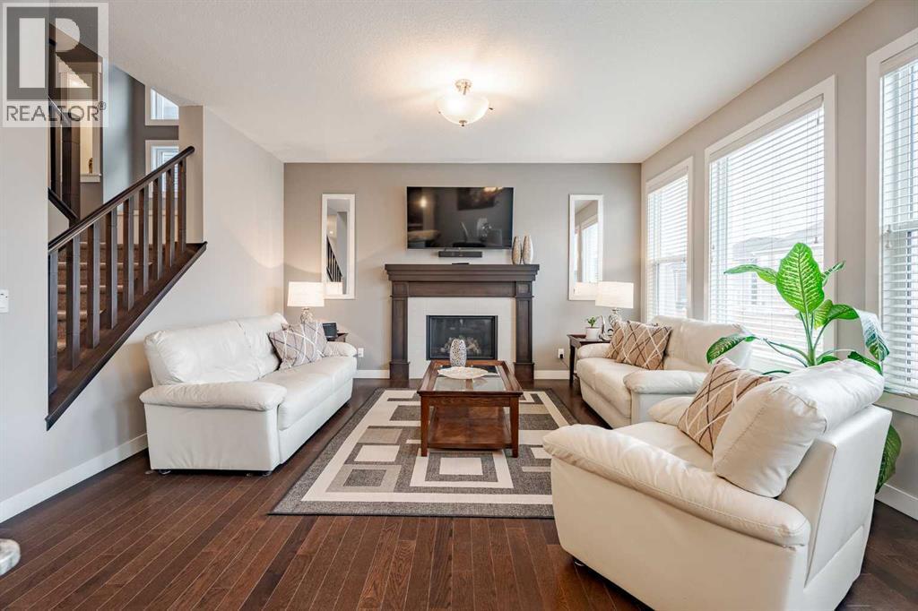 355 Evanston Way Nw, Calgary, AB - Indoor Photo Showing Living Room With Fireplace