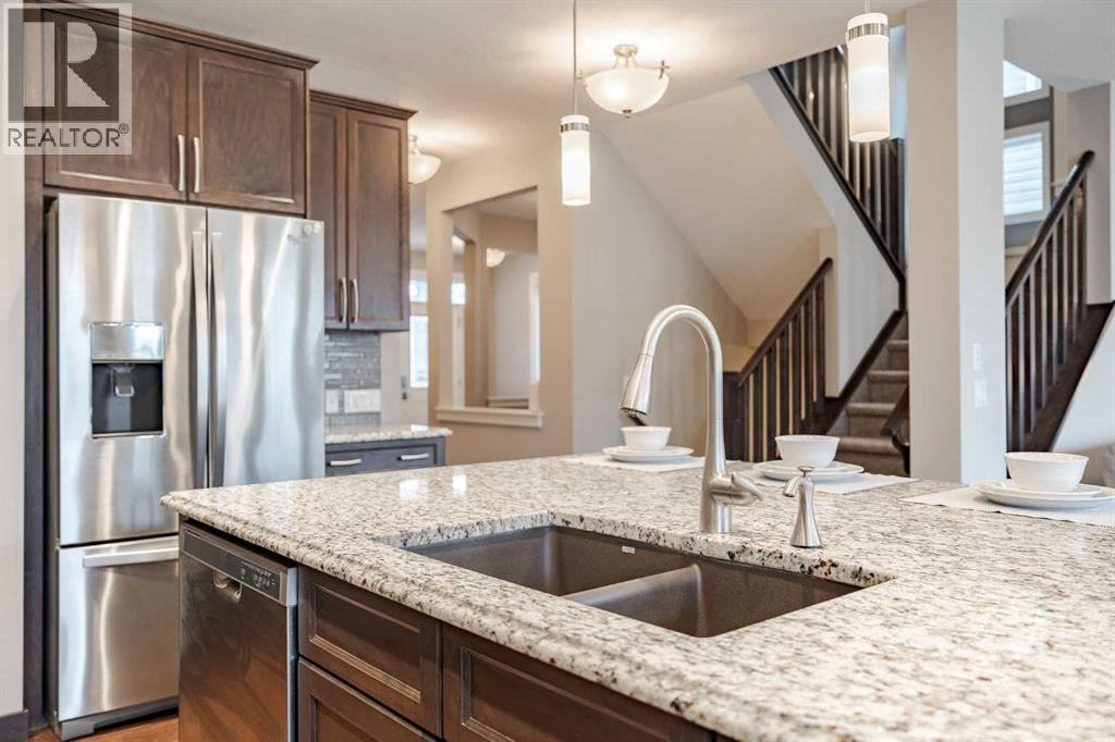 355 Evanston Way Nw, Calgary, AB - Indoor Photo Showing Kitchen With Double Sink With Upgraded Kitchen