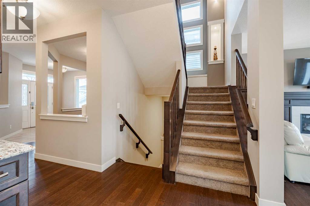 355 Evanston Way Nw, Calgary, AB - Indoor Photo Showing Other Room With Fireplace
