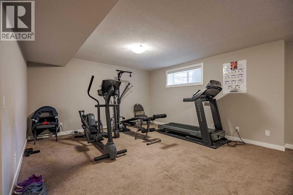 355 Evanston Way Nw, Calgary, AB - Indoor Photo Showing Gym Room