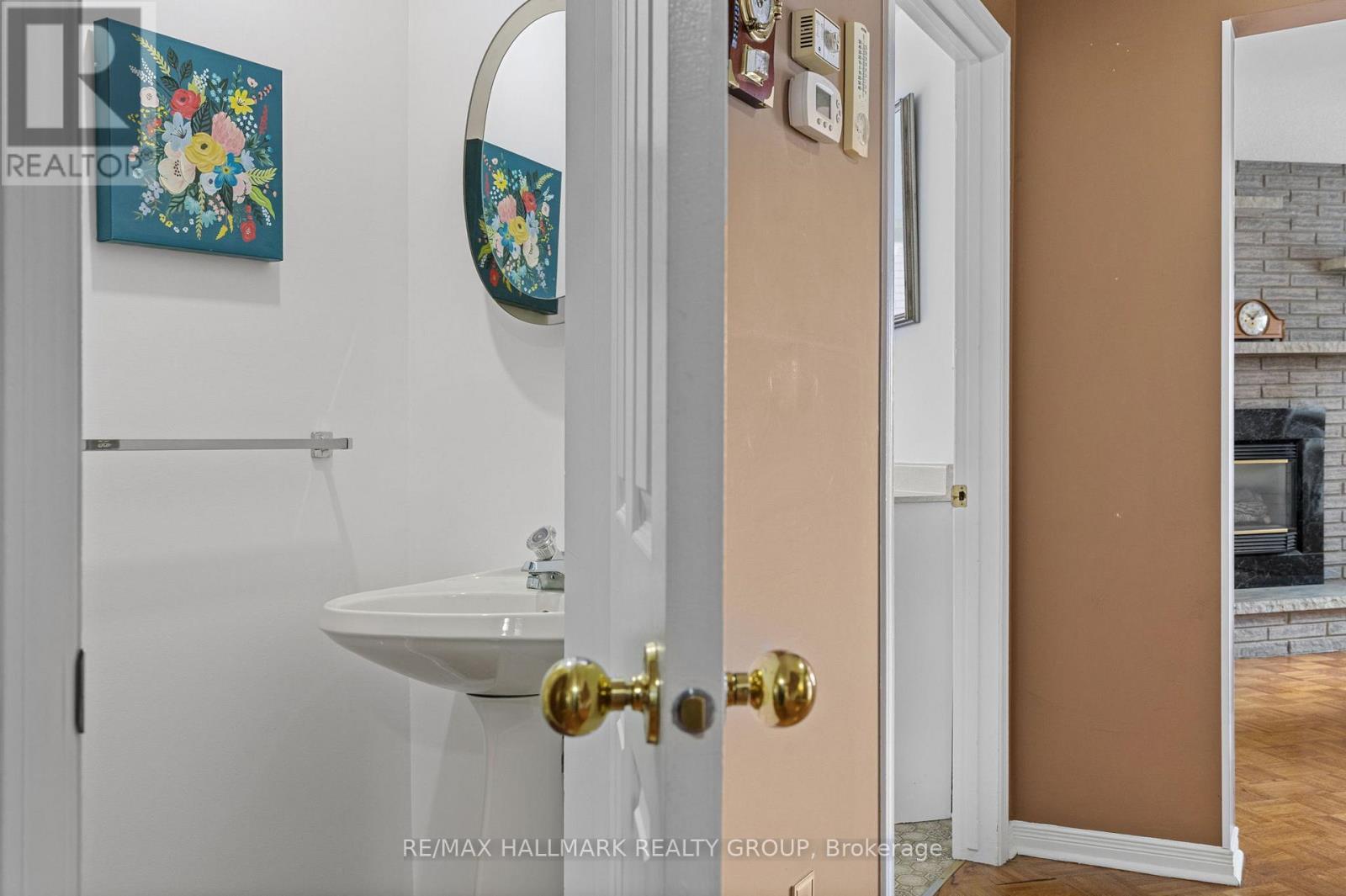 Main floor powder room door - 944 Greenbriar Avenue, Ottawa, ON - Indoor Photo Showing Bathroom