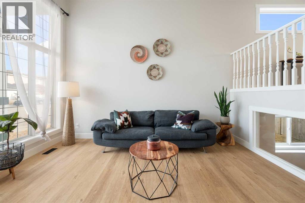 Living Room - 111 Woodside Circle Nw, Airdrie, AB - Indoor Photo Showing Living Room