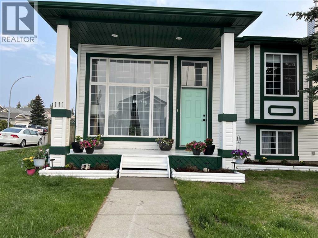 Front Exterior - 111 Woodside Circle Nw, Airdrie, AB - Outdoor With Facade