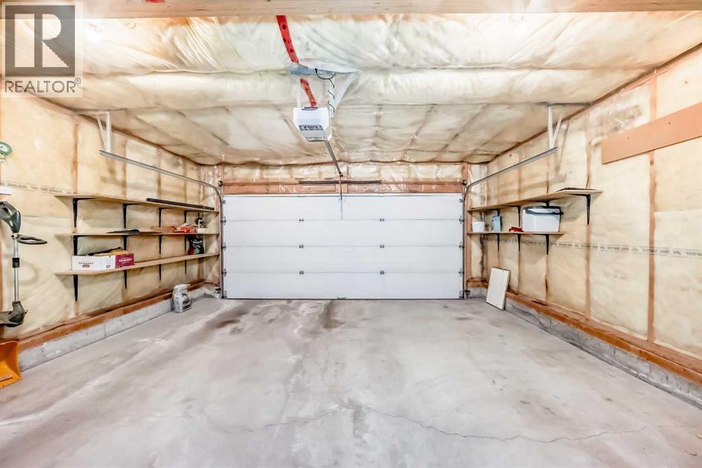 11931 Valley Ridge Drive Nw, Calgary, AB - Indoor Photo Showing Garage