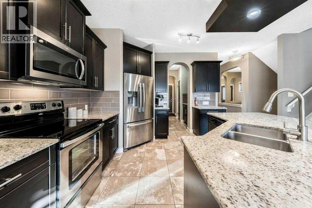 285 Evanspark Gardens Nw, Calgary, AB - Indoor Photo Showing Kitchen With Stainless Steel Kitchen With Double Sink With Upgraded Kitchen