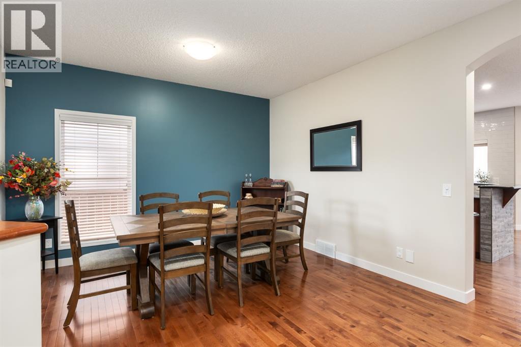 Hardwood floors - 128 Seagreen Manor, Chestermere, AB - Indoor Photo Showing Dining Room