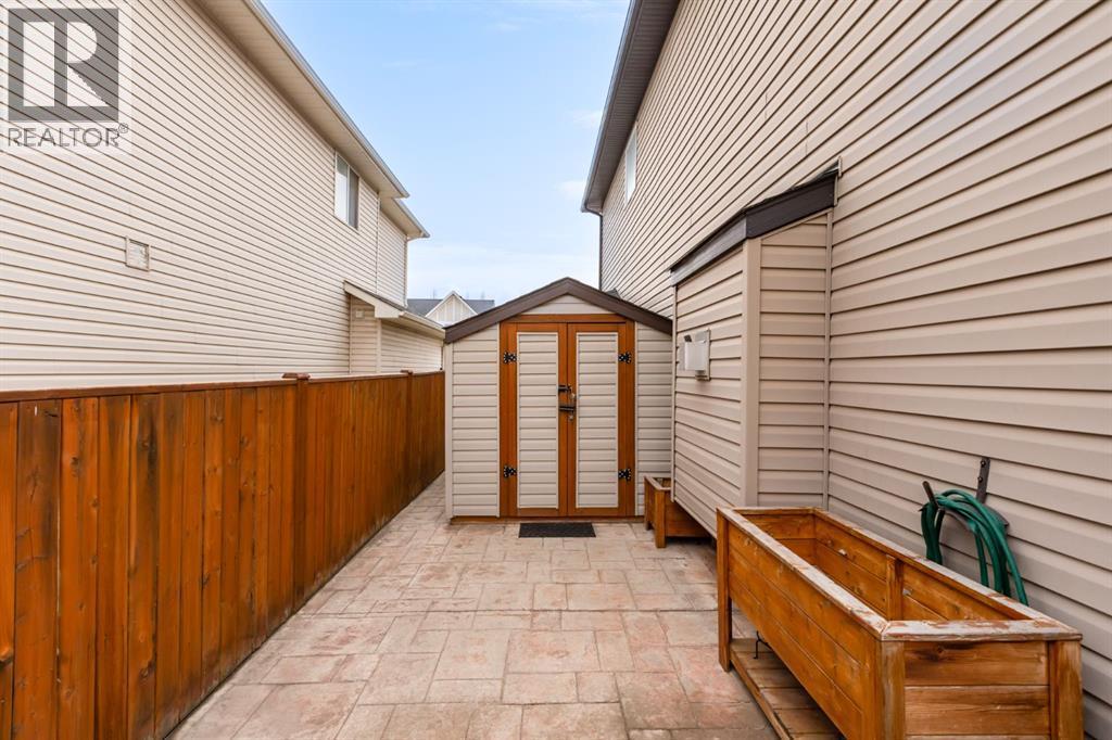 Large storage shed included - 128 Seagreen Manor, Chestermere, AB - Outdoor With Exterior