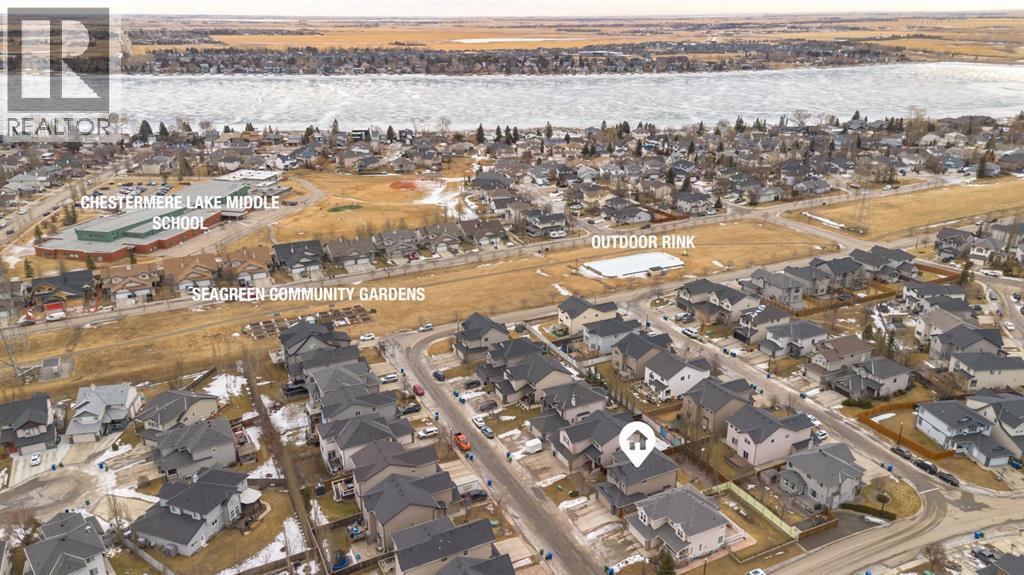 Walking distance to all amenities! - 128 Seagreen Manor, Chestermere, AB - Outdoor With Body Of Water With View