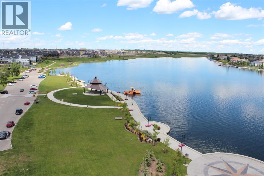 Lake living in Chestermere! - 128 Seagreen Manor, Chestermere, AB - Outdoor With Body Of Water With View