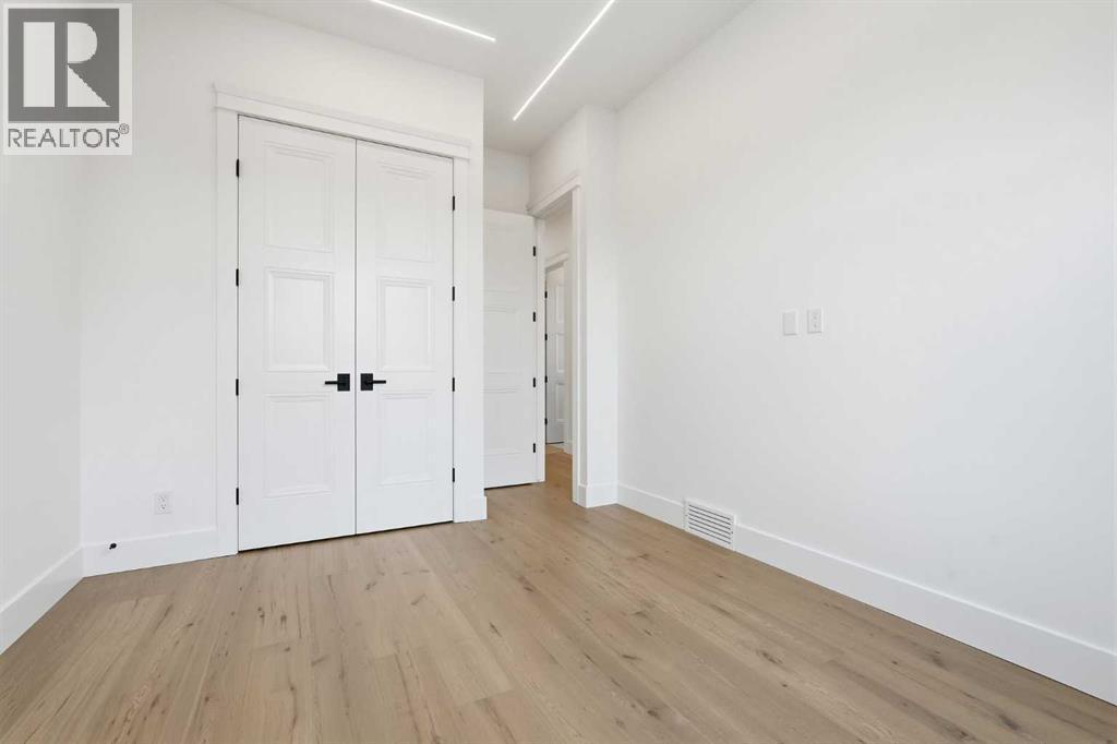 134 Lissington Drive Sw, Calgary, AB - Indoor Photo Showing Other Room