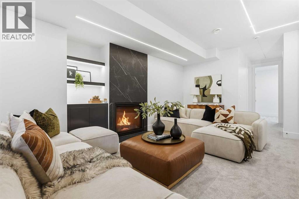 134 Lissington Drive Sw, Calgary, AB - Indoor Photo Showing Living Room With Fireplace