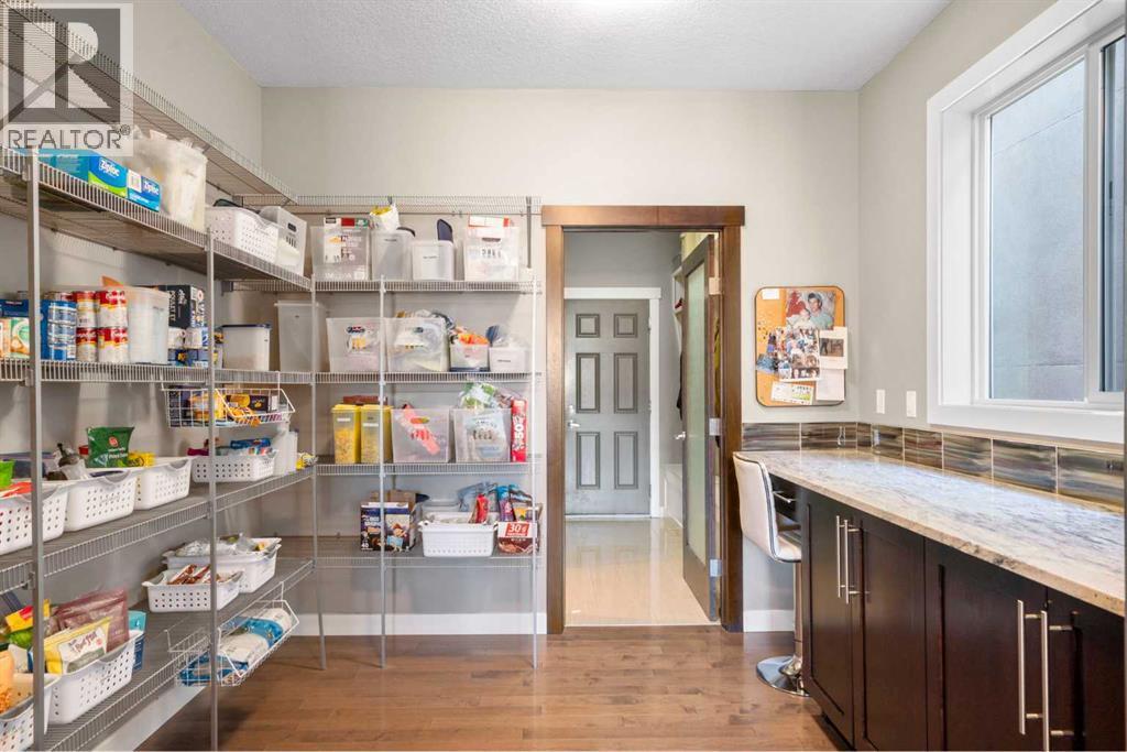 Massive Walk thru pantry - 173 Sage Meadows Circle Nw, Calgary, AB - Indoor With Storage