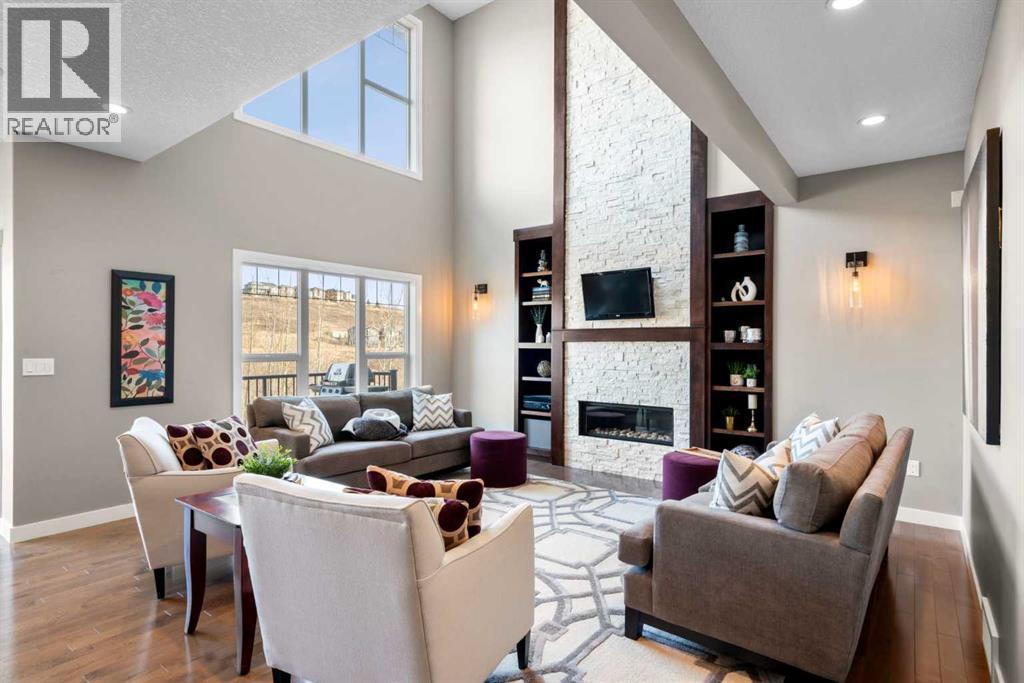 173 Sage Meadows Circle Nw, Calgary, AB - Indoor Photo Showing Living Room With Fireplace
