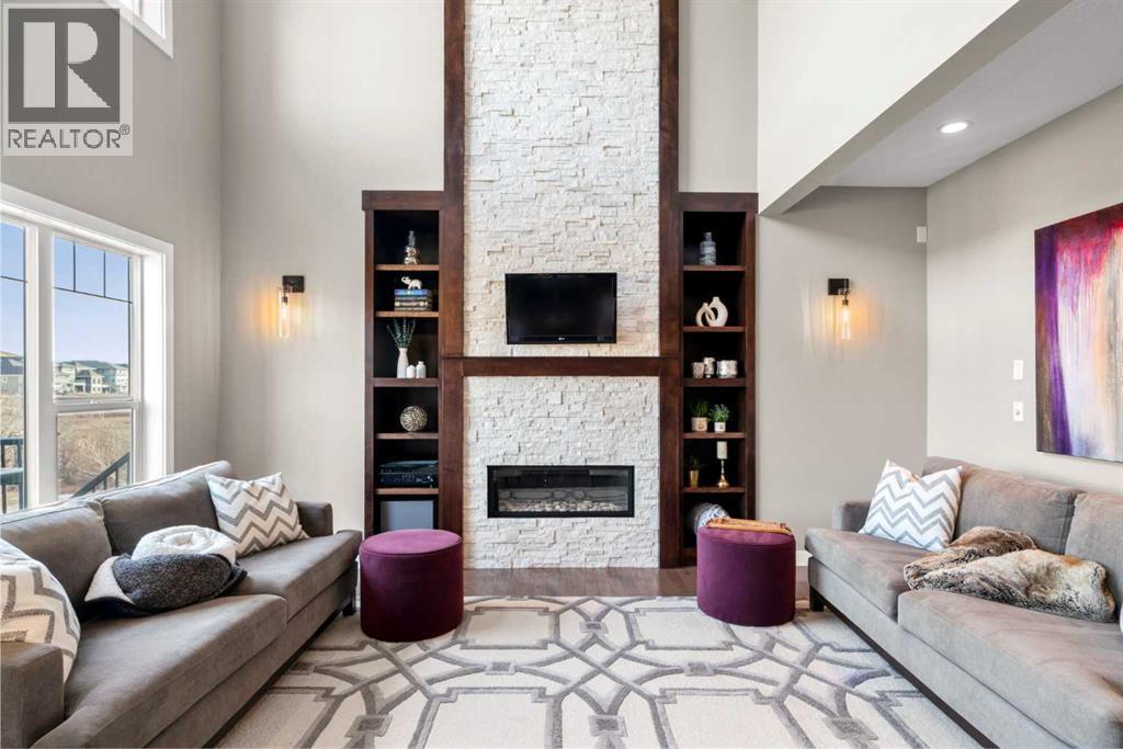 173 Sage Meadows Circle Nw, Calgary, AB - Indoor Photo Showing Living Room With Fireplace