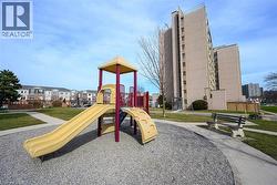 Community playground with a yard -