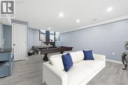 Rec room featuring billiards table and light wood-style floors -