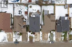 Snowy aerial view with a residential view -