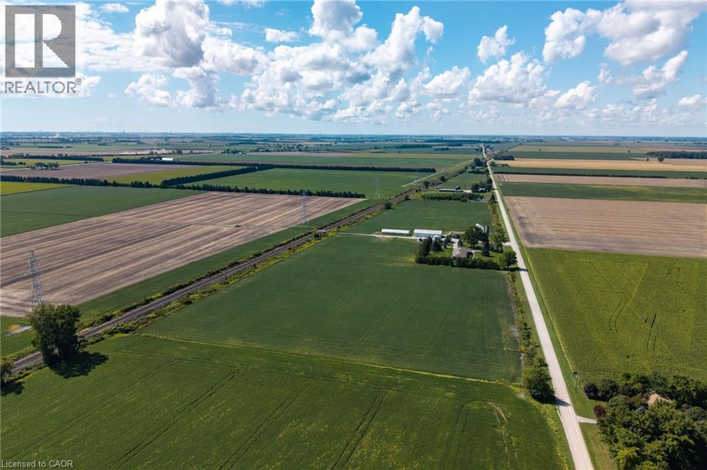 Aerial view of sparsely populated area featuring abundant farmland - 6828 Third Line, Chatham, ON