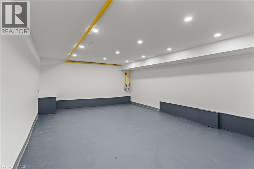 Garage featuring recessed lighting - 93 John Street S, Hamilton, ON