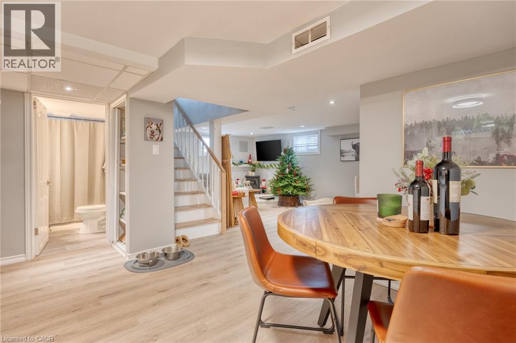Dining space featuring light wood-type flooring - 99 East 36Th Street, Hamilton, ON - Indoor Photo Showing Other Room