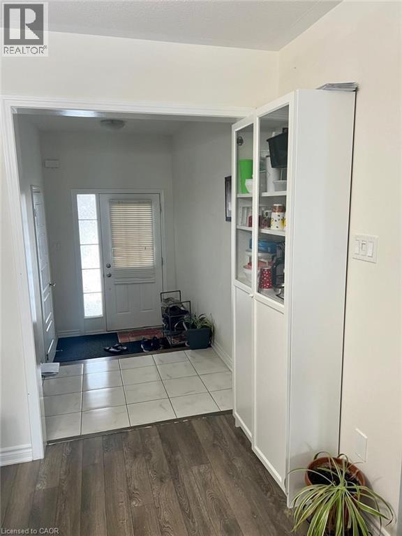 Foyer featuring hardwood / wood-style flooring - 128 Watermill Street, Kitchener, ON - Indoor Photo Showing Other Room