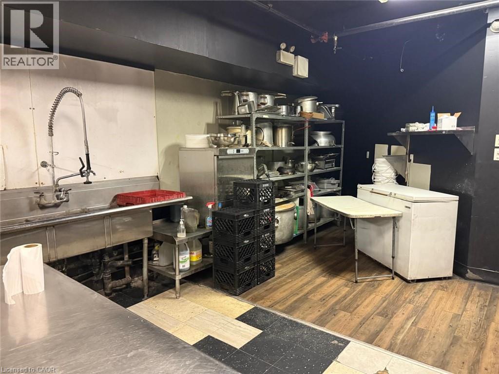 Bar with white fridge - 179 King Street W, Kitchener, ON