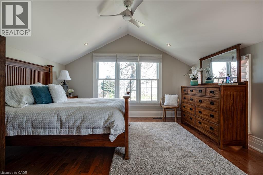 Bedroom featuring vaulted ceiling, ceiling fan, wood finished floors, and recessed lighting - 849 Beach Boulevard, Hamilton, ON - Indoor Photo Showing Bedroom