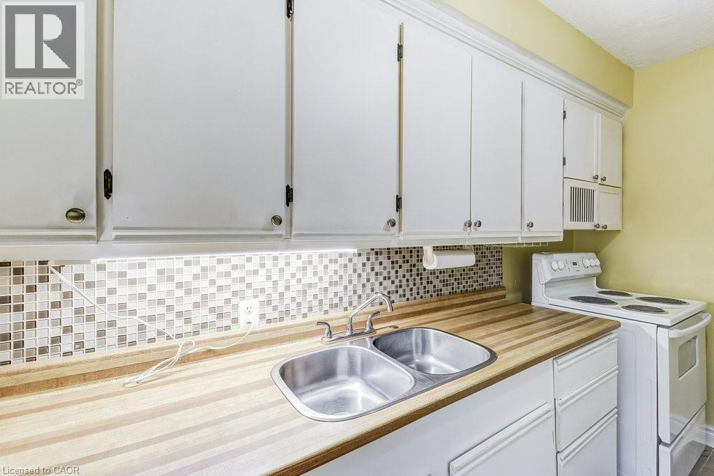 2418 New Street Unit# 1, Burlington, ON - Indoor Photo Showing Kitchen With Double Sink