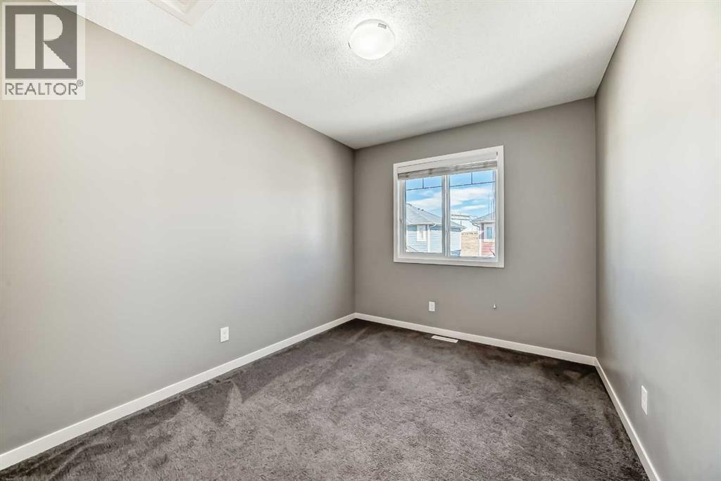 238 Panatella Nw, Calgary, AB - Indoor Photo Showing Other Room