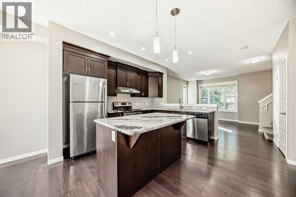 238 Panatella Nw, Calgary, AB - Indoor Photo Showing Kitchen With Upgraded Kitchen