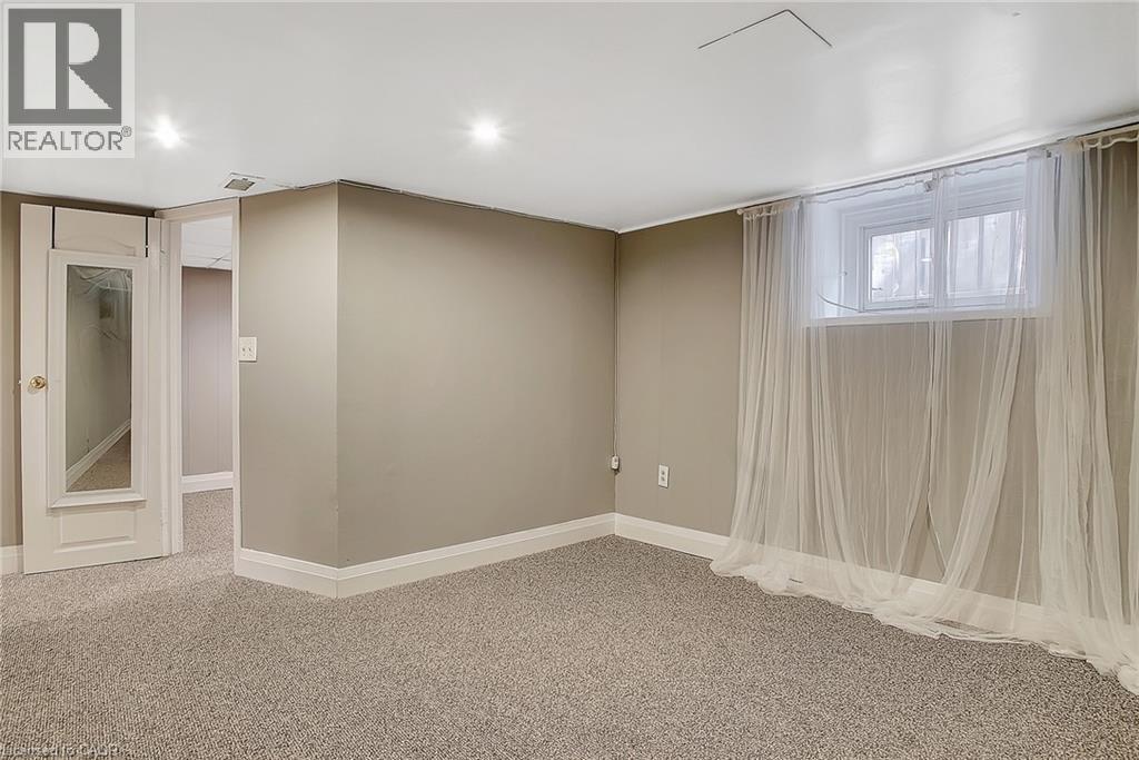 Main Unit Basement - 211 Dolph Street N, Cambridge, ON - Indoor Photo Showing Other Room