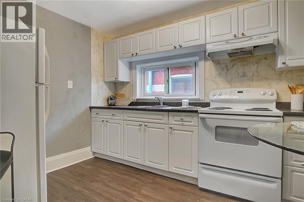 Upper Unit - 211 Dolph Street N, Cambridge, ON - Indoor Photo Showing Kitchen With Double Sink