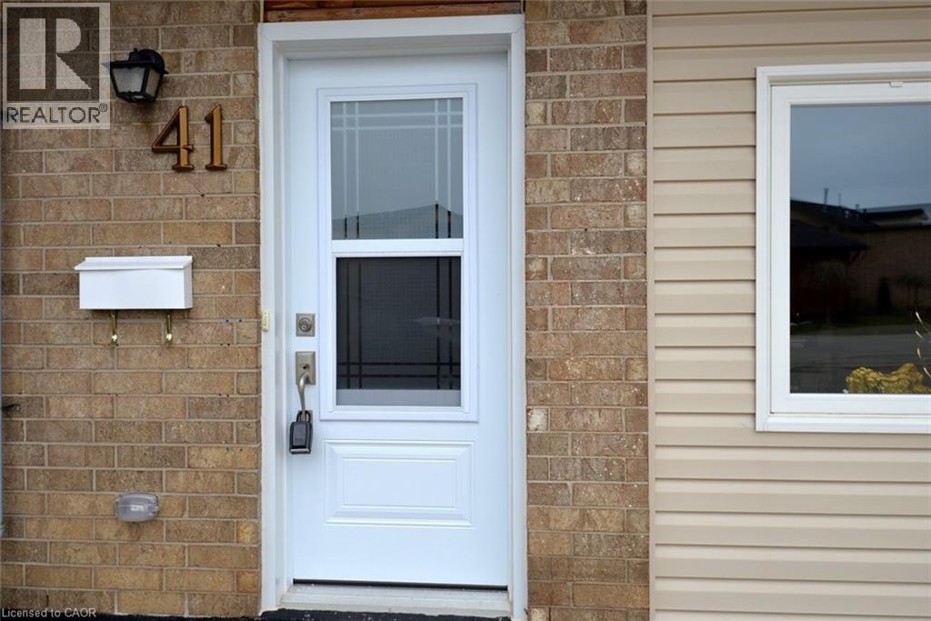 Entrance to property with brick siding - 41 Sister Kern Terrace, Hamilton, ON - Outdoor With Exterior