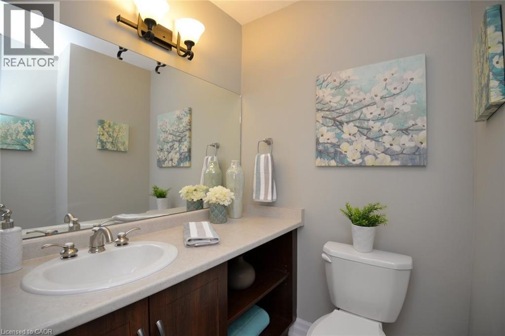 Bathroom with vanity and toilet - 41 Sister Kern Terrace, Hamilton, ON - Indoor Photo Showing Bathroom