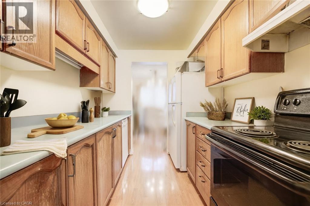 Virtually Staged - 465 Woolwich Street N Unit# 17, Waterloo, ON - Indoor Photo Showing Kitchen