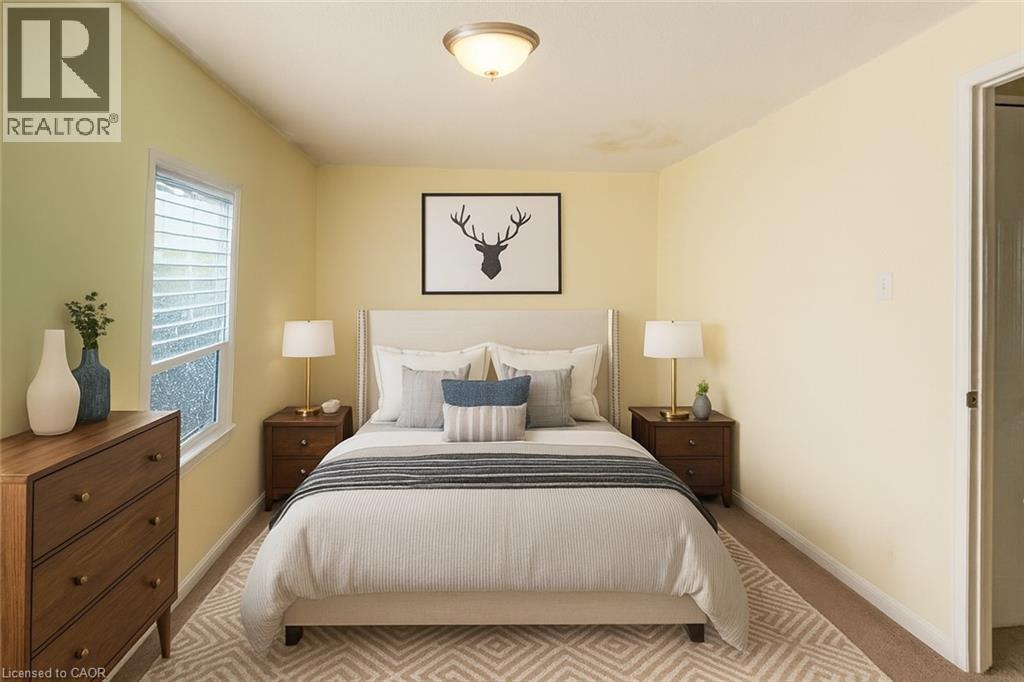 Virtually Staged - 465 Woolwich Street N Unit# 17, Waterloo, ON - Indoor Photo Showing Bedroom