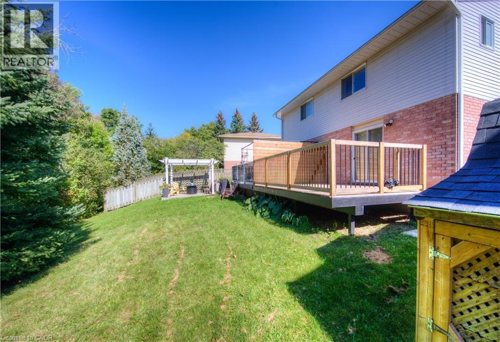 View of yard featuring a wooden deck - 236 Bankside Drive, Kitchener, ON - Outdoor With Deck Patio Veranda With Exterior
