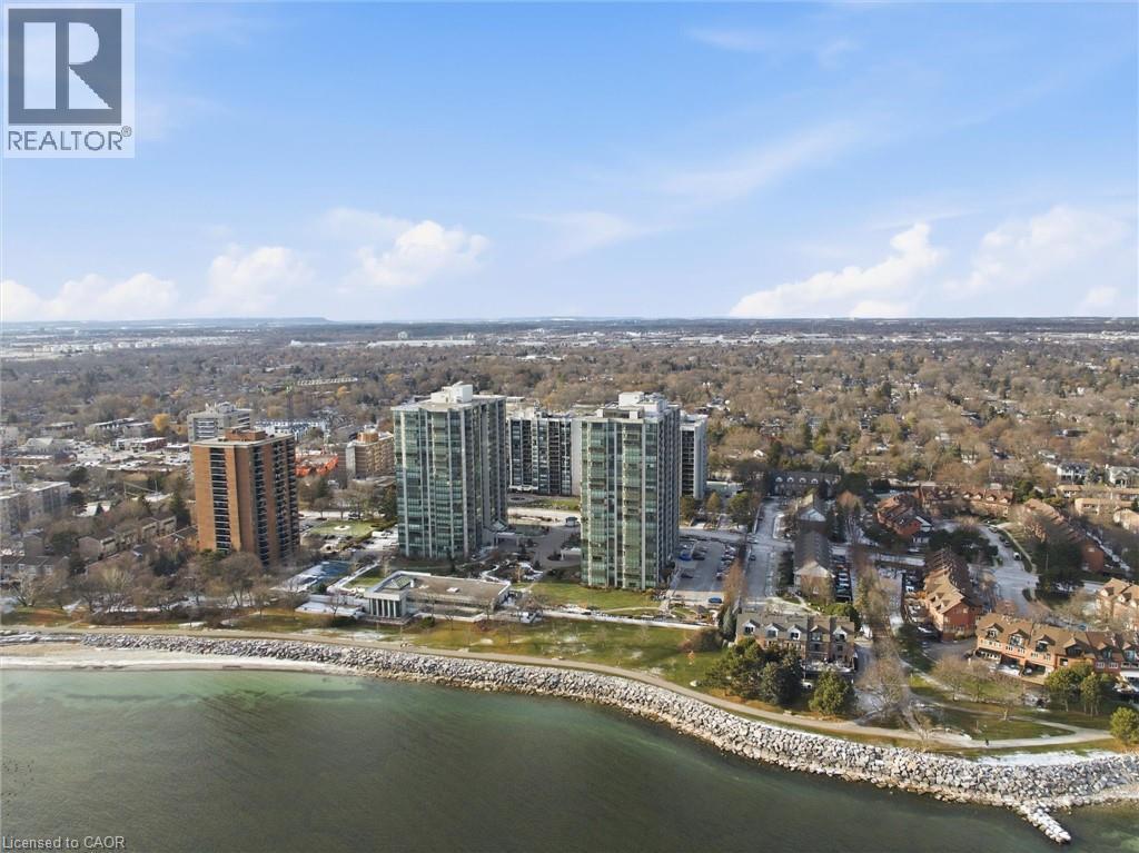 Aerial view of property and surrounding area with a nearby body of water and nearby urban area - 2170 Marine Drive Unit# 1808, Oakville, ON - Outdoor With Body Of Water With View