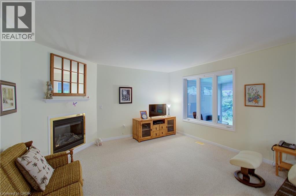 54 Springwood Crescent, Gravenhurst, ON - Indoor Photo Showing Living Room With Fireplace