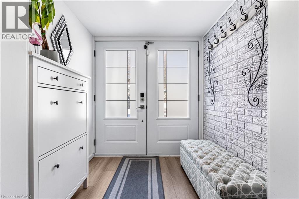 Entryway featuring wood finished floors - 136 Limpert Avenue, Cambridge, ON - Indoor Photo Showing Other Room