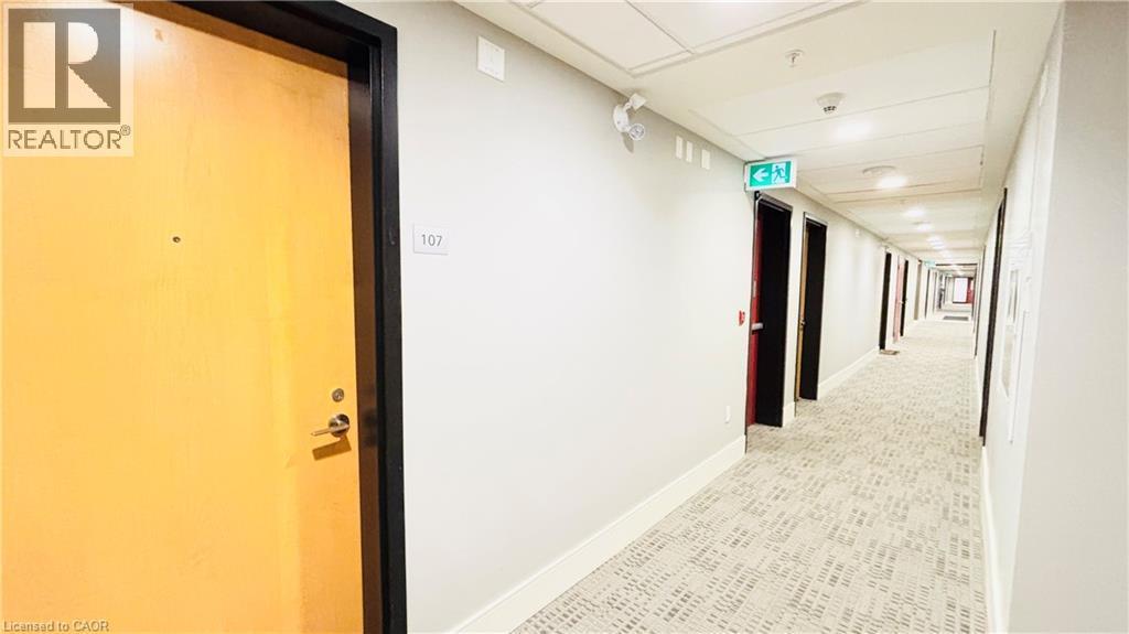 Corridor featuring baseboards - 155 St. Leger Unit# 107, Kitchener, ON - Indoor Photo Showing Other Room